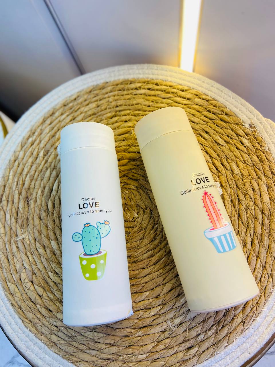 زمزمية زجاج بغطاء بلاستيك وكفر حماية (رسومات صبار)