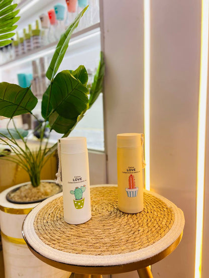 زمزمية زجاج بغطاء بلاستيك وكفر حماية (رسومات صبار)